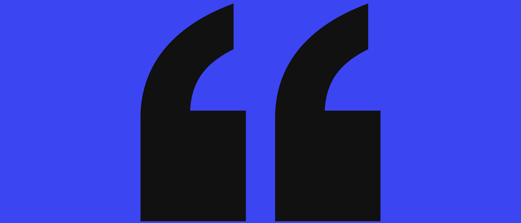 Abstract artwork: two large quotation marks.